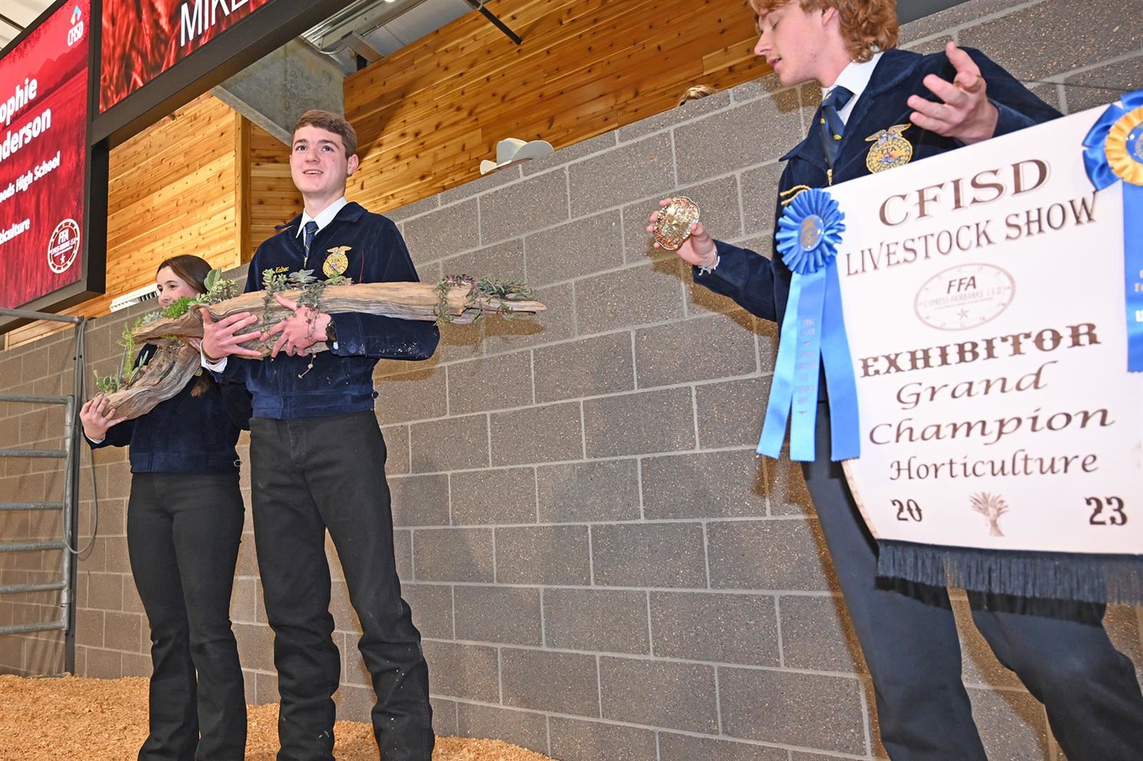 Cy Woods senior Sophie Gunderson, left, had the Grand Champion Horticulture project at the CFISD Livestock Show and Sale.